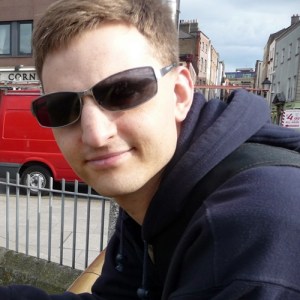 Photo of James wearing sunglasses