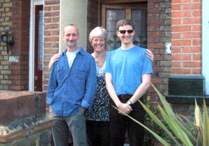 Family photo in front of their house