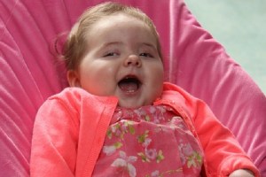 Baby dressed in pink