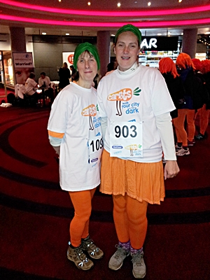 Sisters wearing their carrot themed costumes