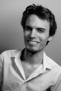 Black and whilte headshot of young man