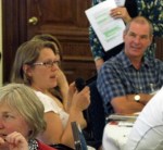 Woman asking a question with a microphone