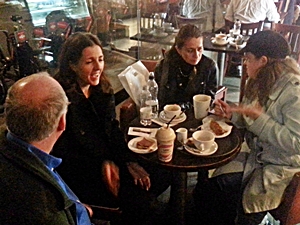 People with aniridia and parents sitting around a table in a coffee shop