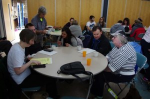 Delegates sitting talking around a circular table