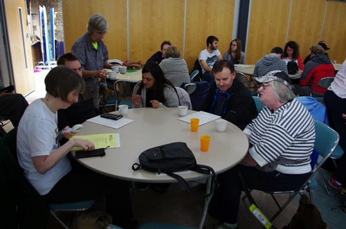 Delegate sitting talking around a circular table