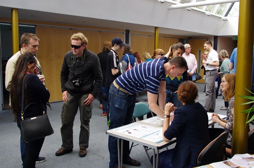 Lots of delegates talking to each other in the atrium