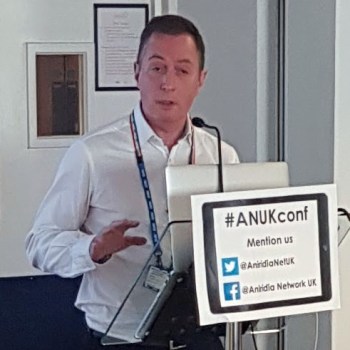 Dr Petch talking at a lectern