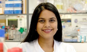 Woman wearing a white coats in a laboratory