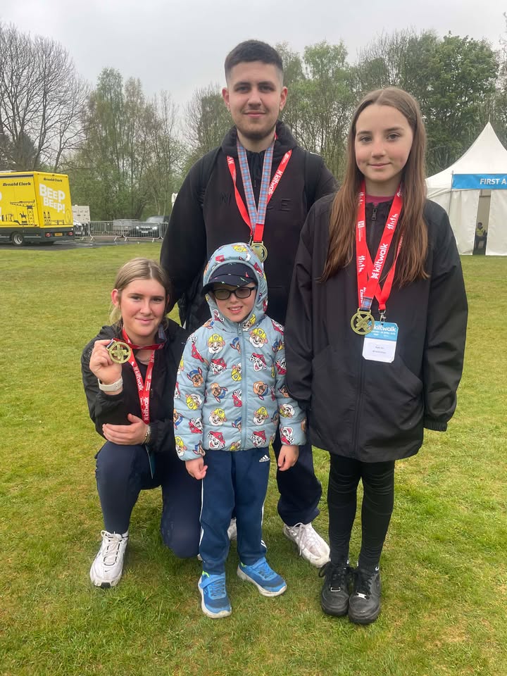 Craig, Katie, Mollie, Callum showing off their medals